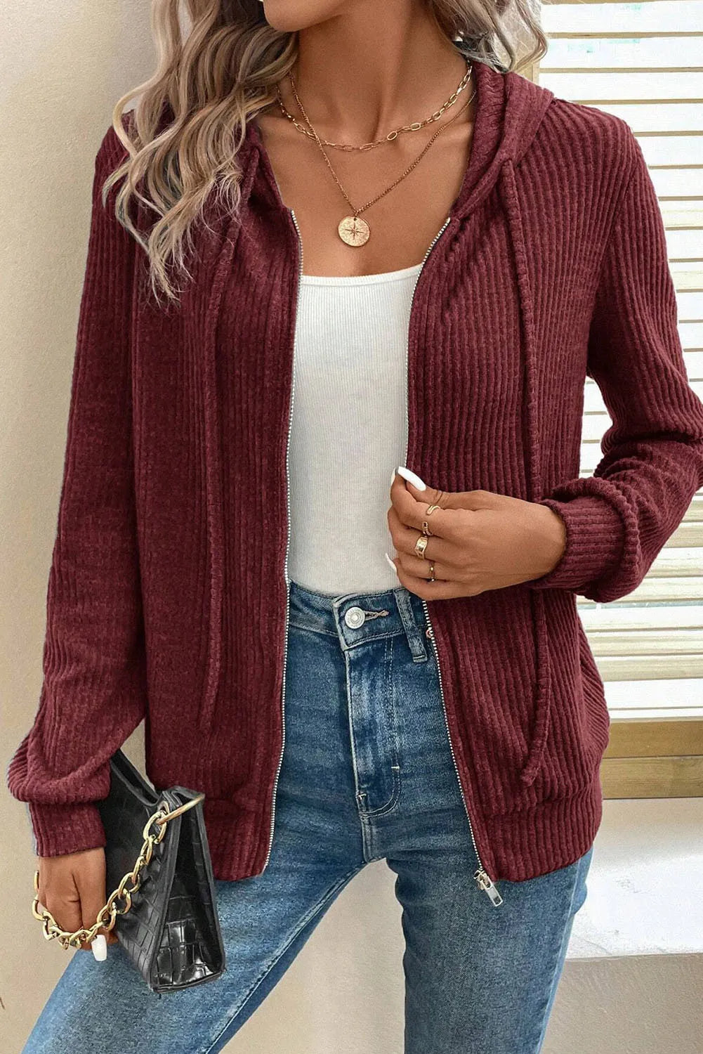 Burgundy ribbed knit zip-up hoodie with drawstring hood and pockets