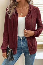 Burgundy ribbed knit zip-up hoodie with drawstring hood and pockets