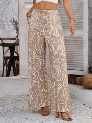 Geometric print wide-leg trousers in Dust Storm with drawstring waist and pockets.