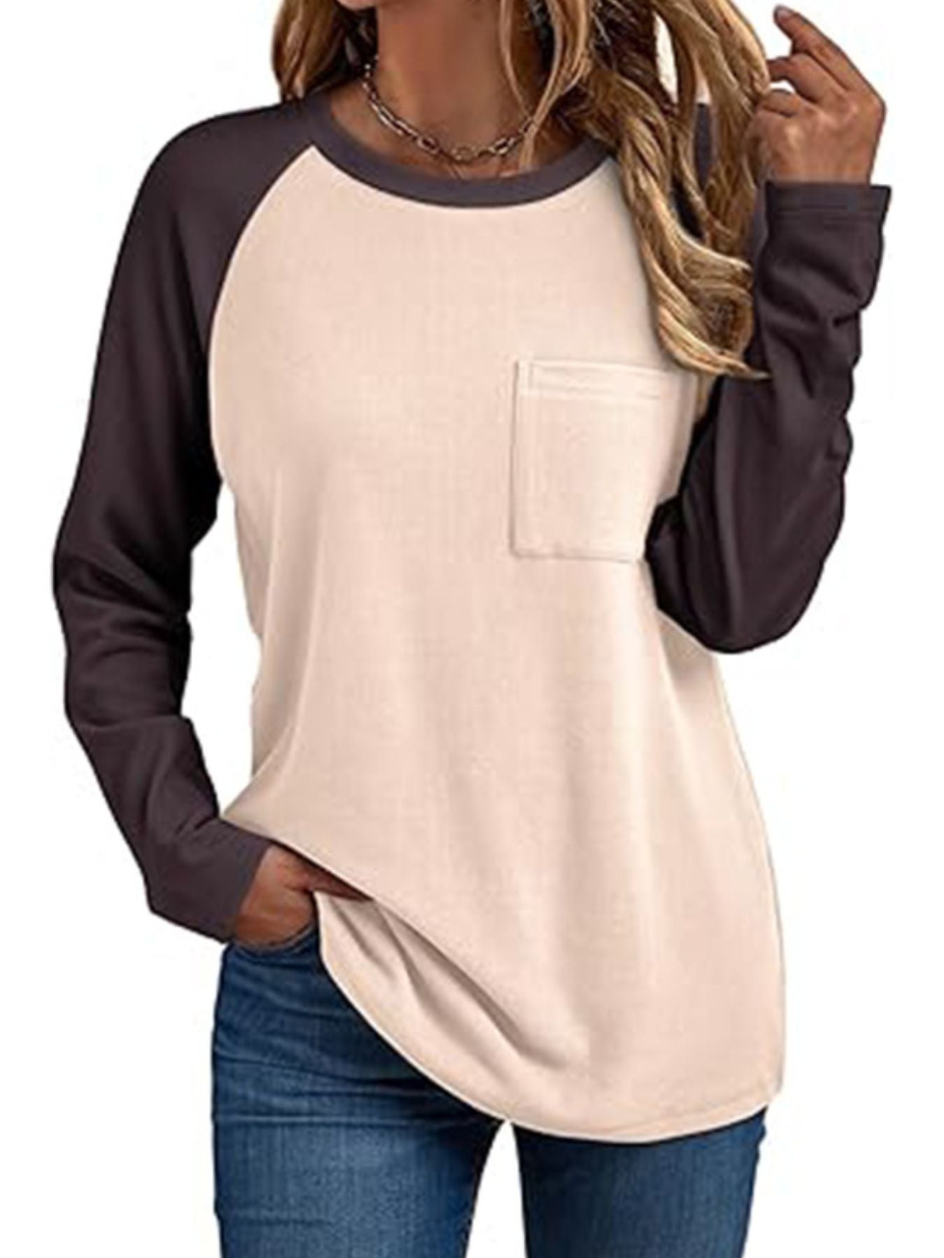 Pocketed round neck long sleeve t-shirt in tan with dark gray sleeves and a chest pocket.