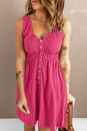 Pink button-down mini dress with gathered waist and V-neck