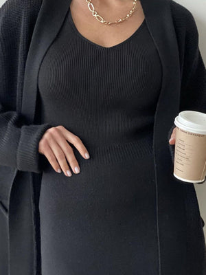 Black ribbed knit cardigan and v-neck tank top set with a modern silhouette.