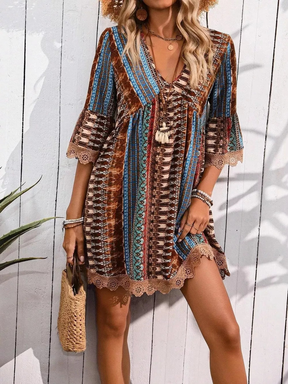 Bohemian printed v-neck dress with bell sleeves and lace trim