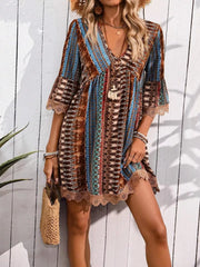 Bohemian printed v-neck dress with bell sleeves and lace trim