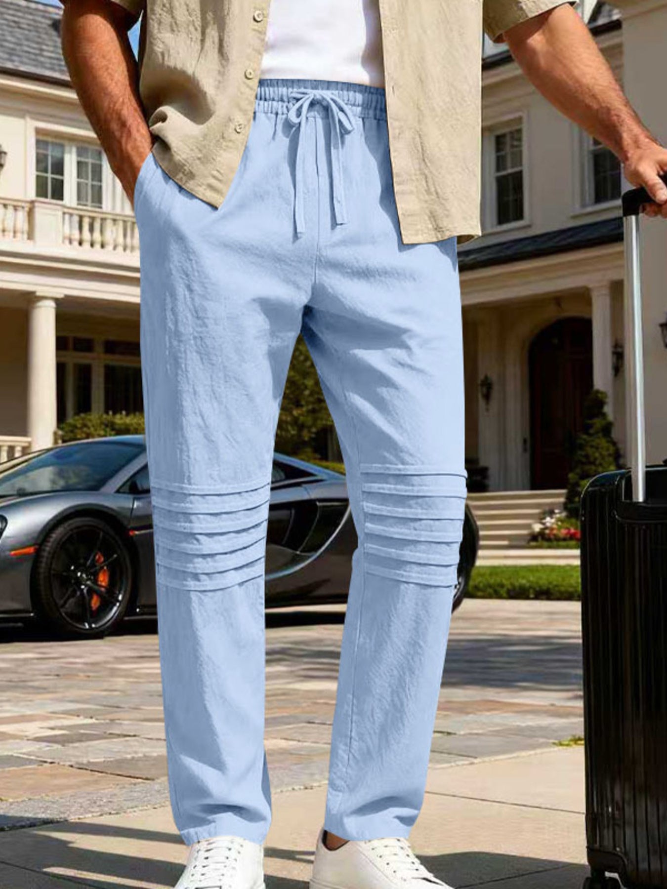 Men's light blue linen-blend drawstring sweatpants with pleated knee detail
