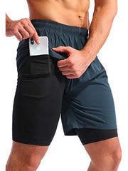 Dual-layer training shorts in Peacock Blue with black compression liner and phone pocket.