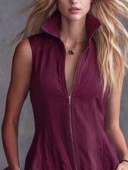 Burgundy high-low ruffled dress with zipper and pointed collar.