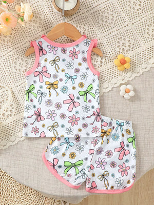 Toddler white floral & bowknot tank top and shorts set with pink trim.