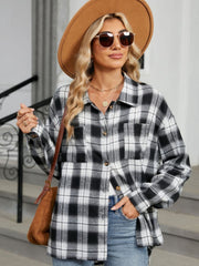 Black and white plaid collared long sleeve shirt with buttoned pockets