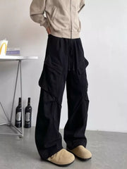 Black relaxed fit cargo pants with drawstring and multi pockets.