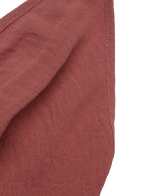 Plunging V-neck maxi dress in rose red linen with tiered skirt detail.