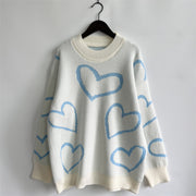 Heart Outline Knit Sweater in Pastel Blue with crewneck and long sleeves.