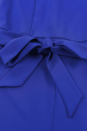 Royal blue tie-waist jumpsuit with a bow detail at the waist.