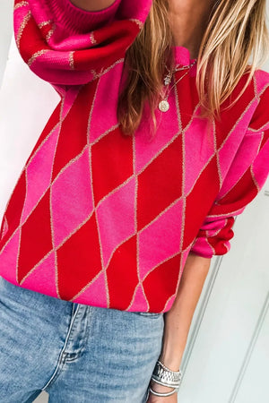 Vibrant argyle knit sweater in deep rose and red with gold sparkle detail and puff sleeves.