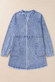 Acid wash denim shirtdress with raw hem, button front, and chest pockets.