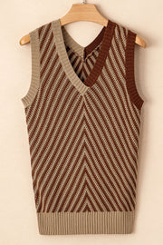 Chevron knit vest in brown and tan with V-neck and open stitch detail.
