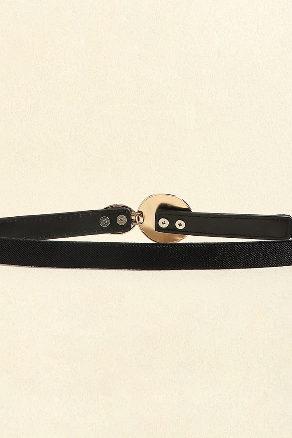 Black elastic waist belt with gold disc detail and faux leather trim