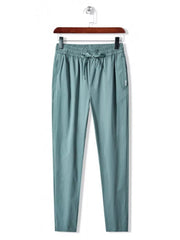 Men's turquoise drawstring active pants with elastic waistband and pockets.