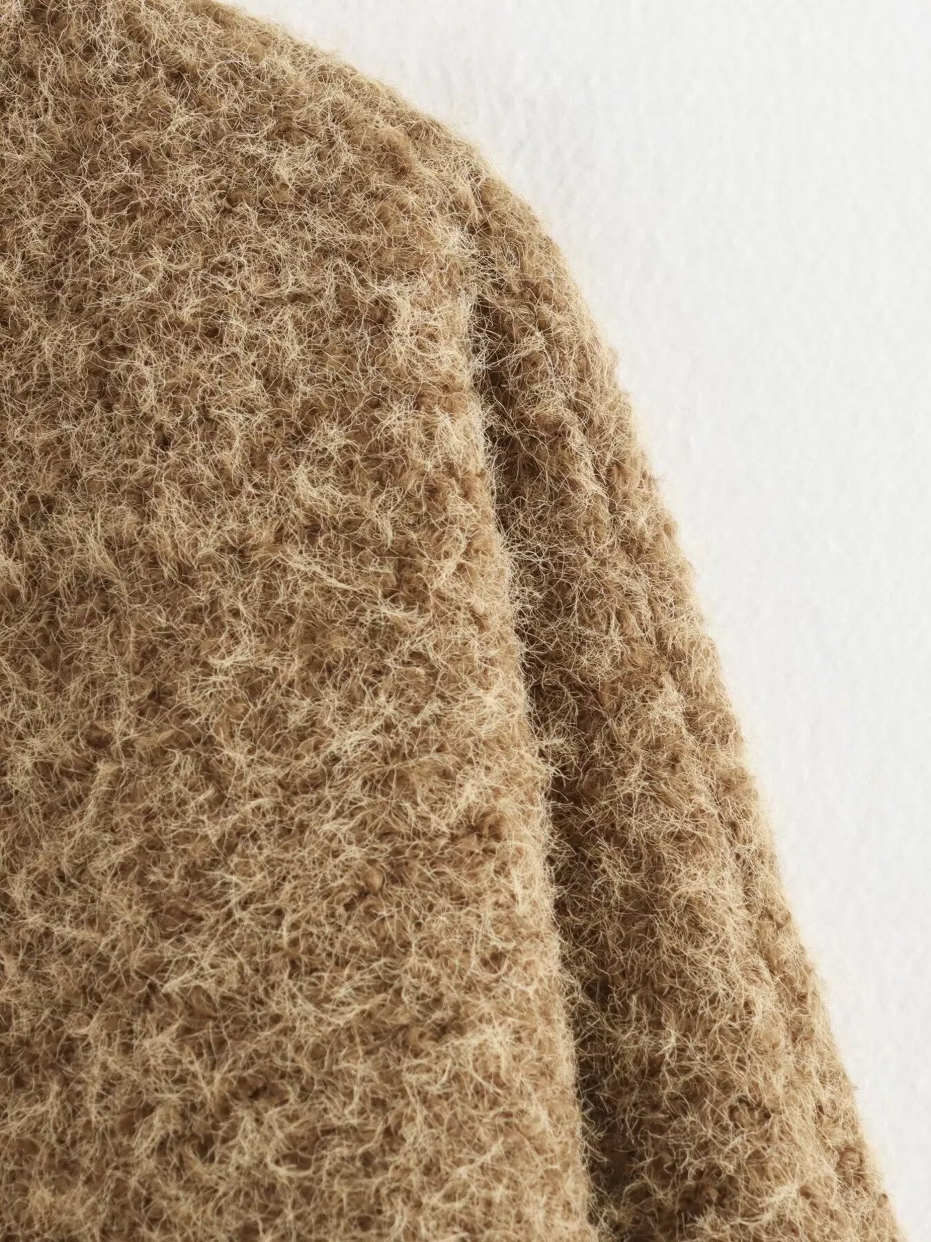 Textured knit tie-front coat in dark brown with a fuzzy, shaggy material.