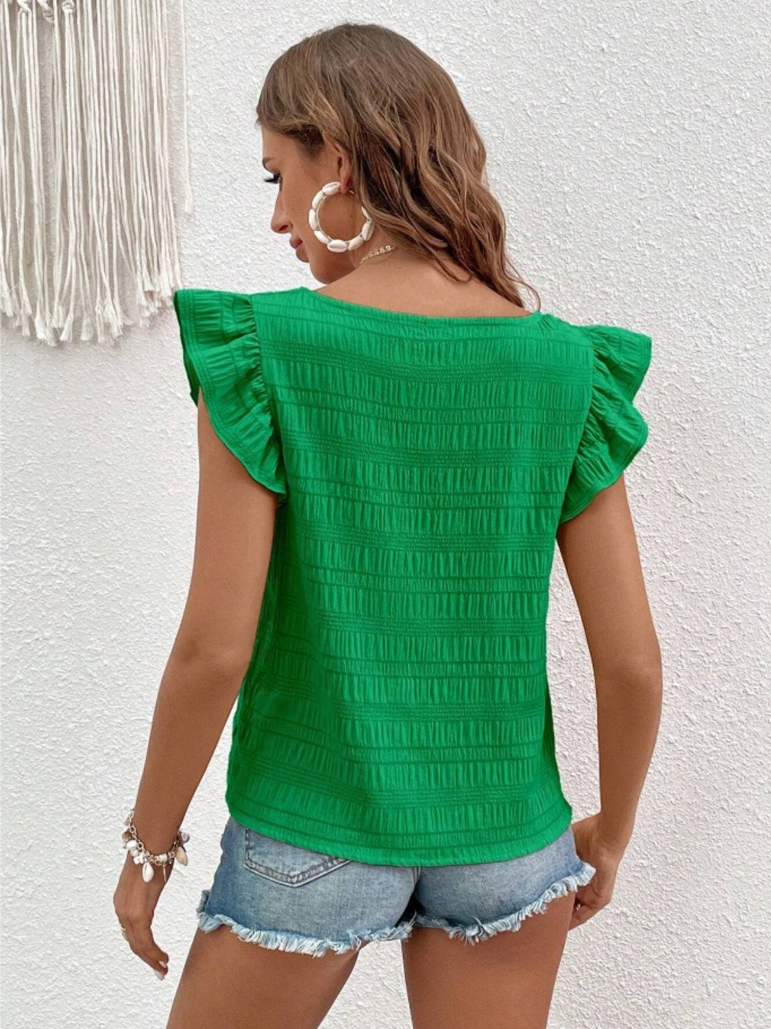 Green textured ruffle sleeve square neck blouse with smocked detail
