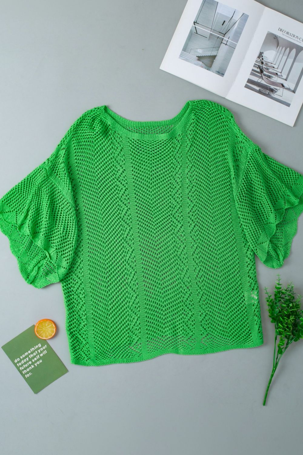 Green open-knit chevron sleeve top with a relaxed fit and crew neck.