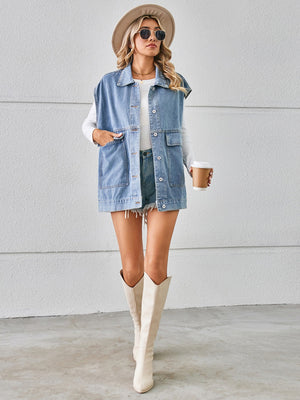Light blue denim utility vest with button front and chest pockets