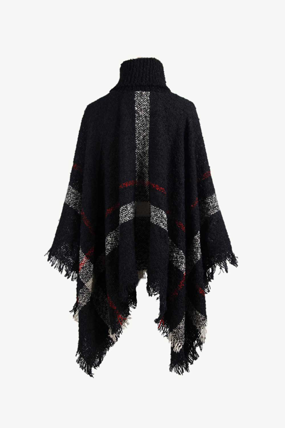 Black plaid turtleneck cape with fringe detail and textured acrylic knit.