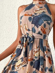 Halter neck maxi dress with floral print and tie waist