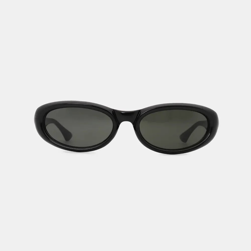 Black cat eye sunglasses with dark lenses and a glossy finish.