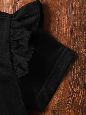 Black baby set with ruffled short sleeves and heart appliqué detail.