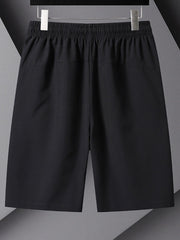 Men's black athletic shorts with drawstring and pockets.