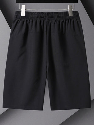 Men's black athletic shorts with drawstring and pockets.