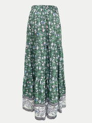 Green floral maxi tiered skirt with a border print hem and elastic waist.