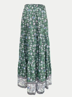 Green floral maxi tiered skirt with a border print hem and elastic waist.