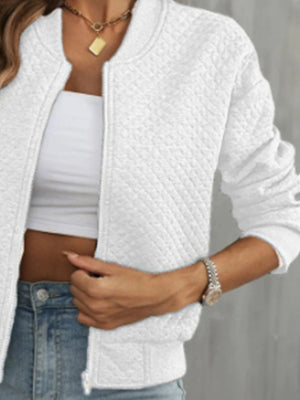 White diamond quilted bomber jacket with a zip front and crew neck.