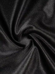 Black satin maxi skirt fabric detail with soft sheen and subtle texture.