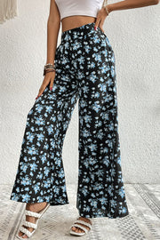 Midnight floral palazzo trousers with a wide leg and high waist.