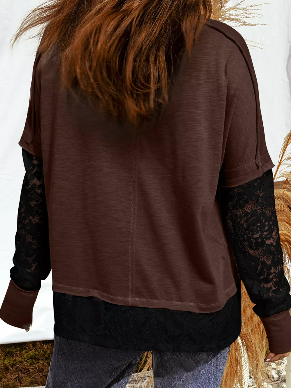 Brown cotton t-shirt with black lace sleeves and hem detail.