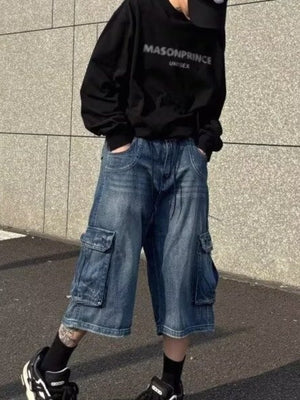 Men's loose fit blue denim cargo shorts with multiple pockets.