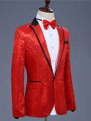 Red sequin one button tuxedo blazer with black lapels and trim, worn with a white shirt and red bow tie.