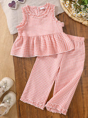 Pink gingham baby set with ruffled neckline and hemmed pants.