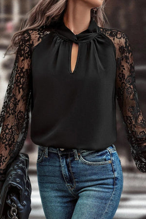 Black blouse with keyhole neckline and lace sleeves