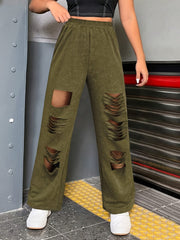 Distressed wide-leg lounge trousers in army green with multiple ripped details.