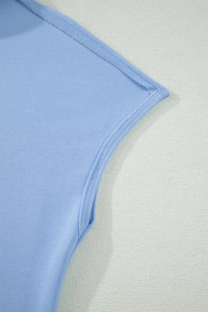 Light blue sleeveless polo top detail with contrast trim and stitching