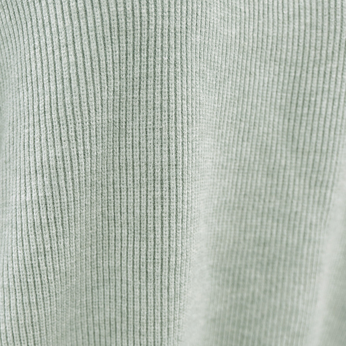 Sage ribbed knit sweater with slouchy sleeves and a close-up texture view.