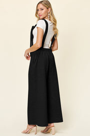 Black textured tie-strap wide-leg maternity jumpsuit with elastic waist