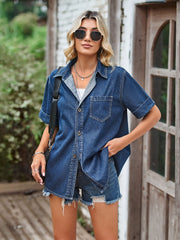 Boxy dark blue denim shirt with short sleeves and a chest pocket.