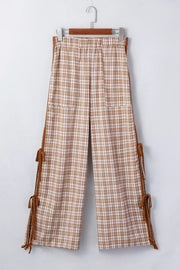 Plaid print casual pants with drawstring waist and side tie details.