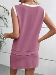 Pink ribbed knit sleeveless top and skort set with white trim