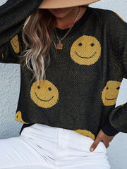 Black smiley face jacquard knit sweater with a crew neck.